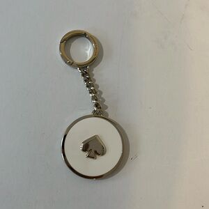 KATE SPADE ENAMEL KEYCHAIN WHITE & SILVER